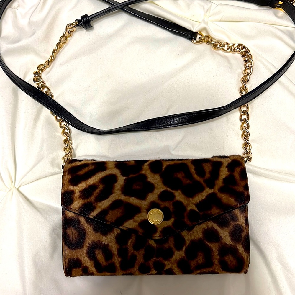 Micheal Kors leopard cross body small purse. Leopard “fur” and leather